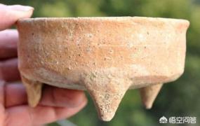 尜是什么意思,出土的古代尖底瓶是做什么用的？